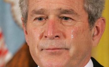 George W Bush throwing first pitch after surgery