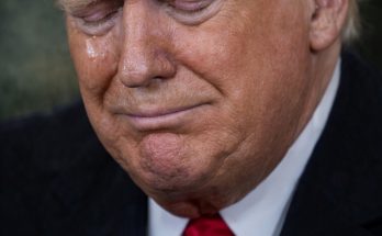 former leader sitting quietly in Washington