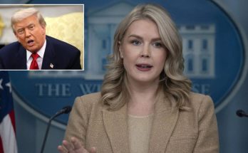 Trump receiving FIFA Peace Prize trophy