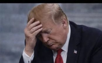 Donald Trump standing quietly in Washington during reflective moment after presidency