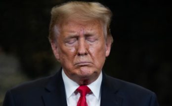 Trump standing silently in Washington moment