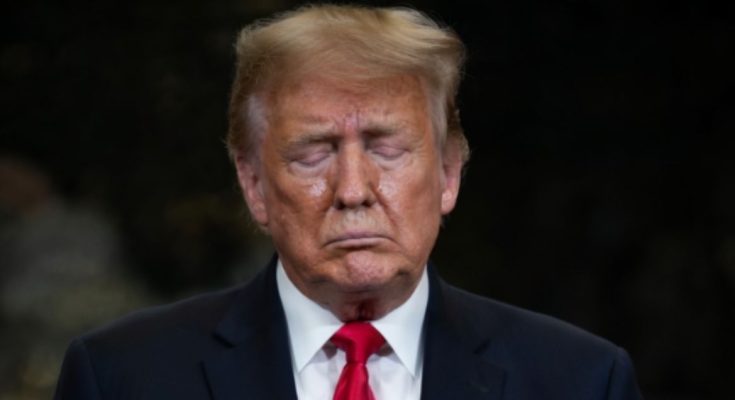 Trump standing silently in Washington moment