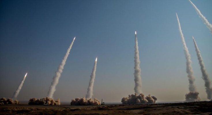 Emergency responders search rubble after rocket barrage destroyed residential buildings