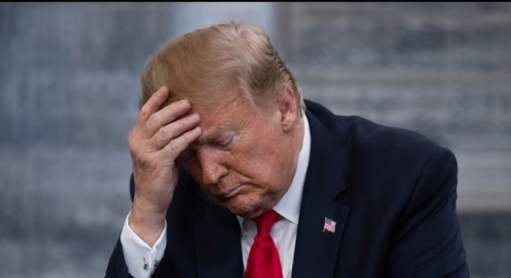 Donald Trump standing quietly in Washington DC