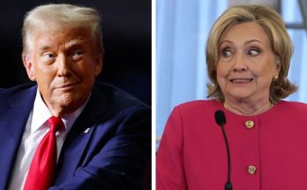 Donald Trump speaking as video about Clinton body count conspiracy plays on screen