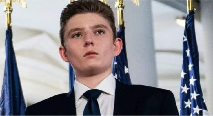 Barron Trump standing beside family publicly