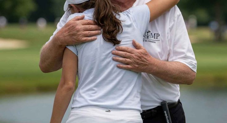 donald Trump in red MAGA cap hugs female golfer in white outfit on green course with