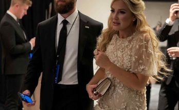 elegant couple in formal attire at glamorous evening event