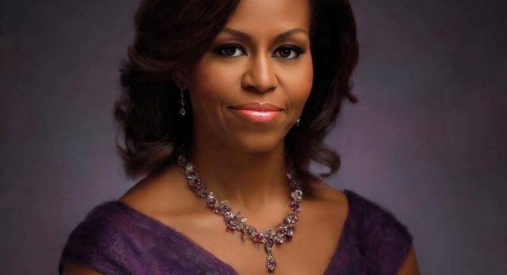 elegant woman in purple dress with necklace, poised expression