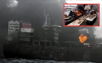 burning oil tanker engulfed in thick black smoke with inset showing dockyard fire damage