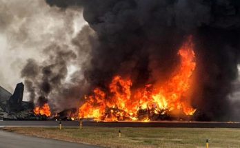 massive fire engulfing a crashed aircraft on runway